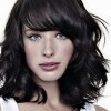 Medium curly hairstyles with bangs